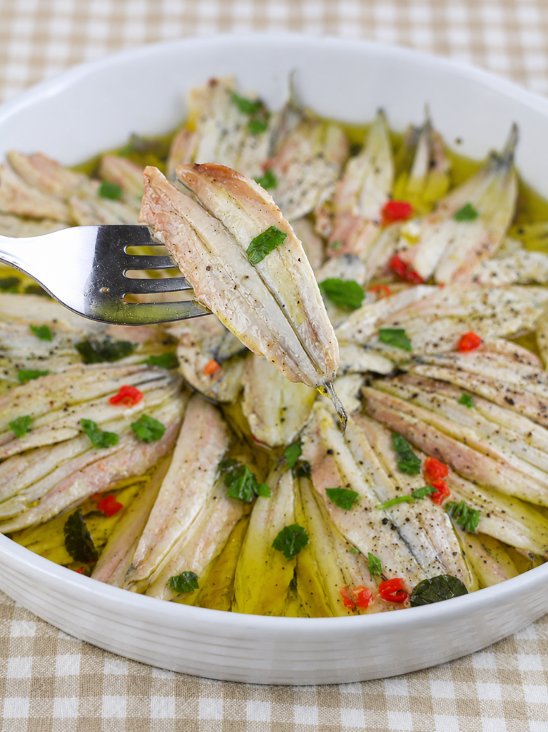 Alici marinate: la ricetta tradizionale per un antipasto fresco, saporito e irresistibile